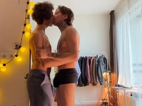 Two twinkies fuck deeply against the wall and cum profusely