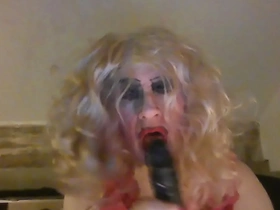 Sissy sarah, craving a big, black cock, tries out an 8 inch dildo, wanks her clitty, has a fag -'a fag for a fag' mistress said, ordering her -'it  makes you look like the street corner whore you are, freely available any guy who wants you&